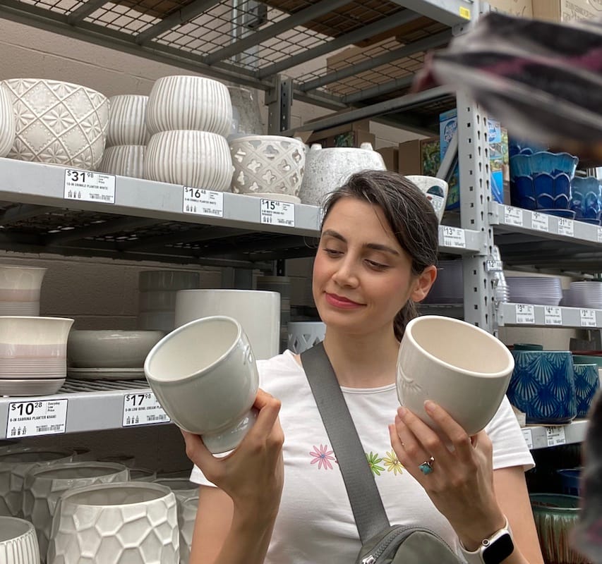 Me browsing Lowe's garden section in a hunt for cute planters!